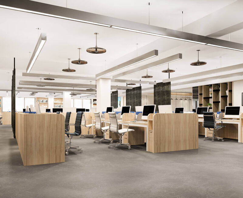 Spacious modern office interior featuring rows of wooden desks, ergonomic chairs, and computers in an open-plan layout