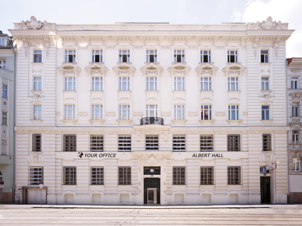 Exterior facade of the historic Your Office Albert Hall building with classic white architecture